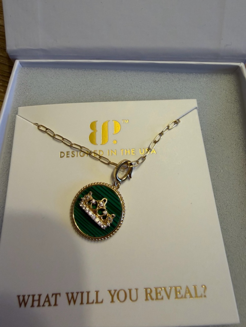 Gold Pendant Necklace with Green Enamel Crown Accent
